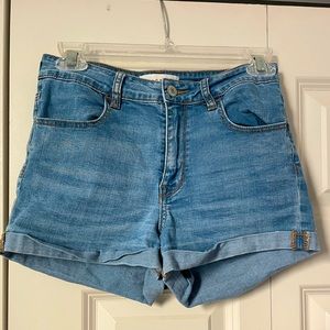 Light blue jean shorts.
